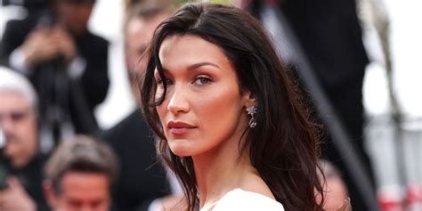 See Bella Hadid Pose Topless with Lavender in a Dreamy Photo。